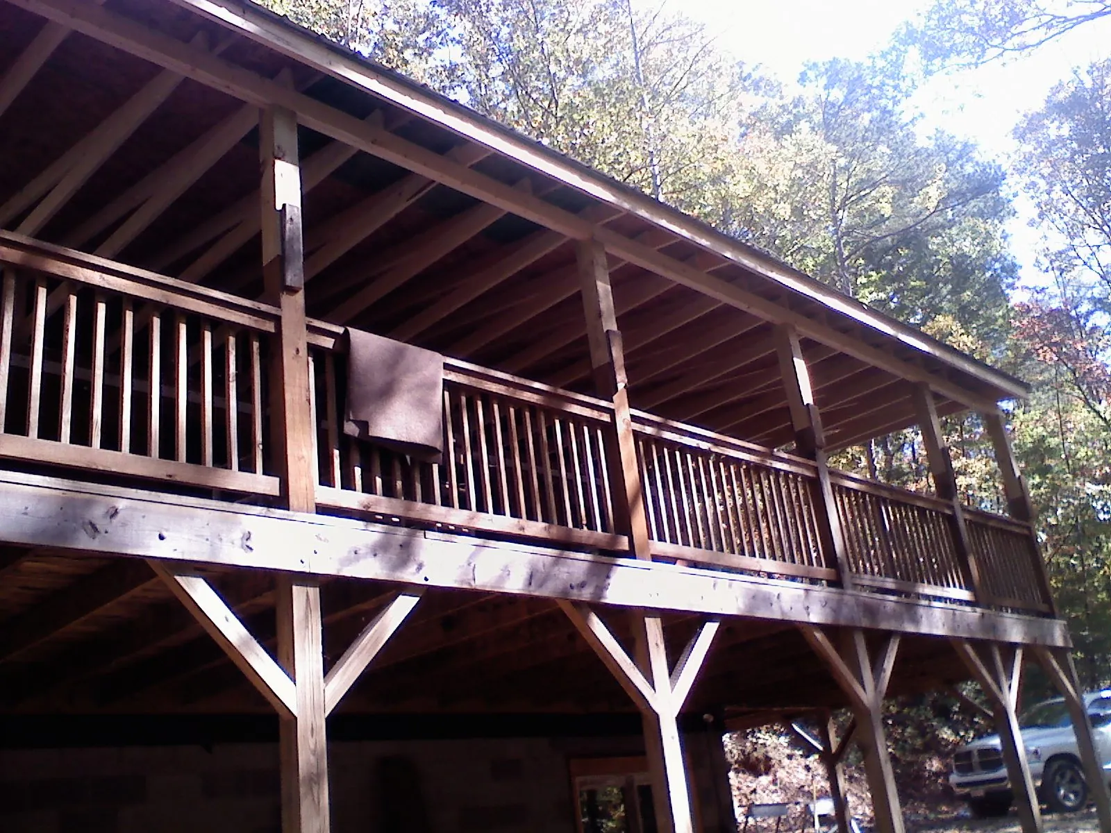 Timber framing under a new elevated porch and deck — Roof Leak Repair in East Flat Rock by Roofing Brothers